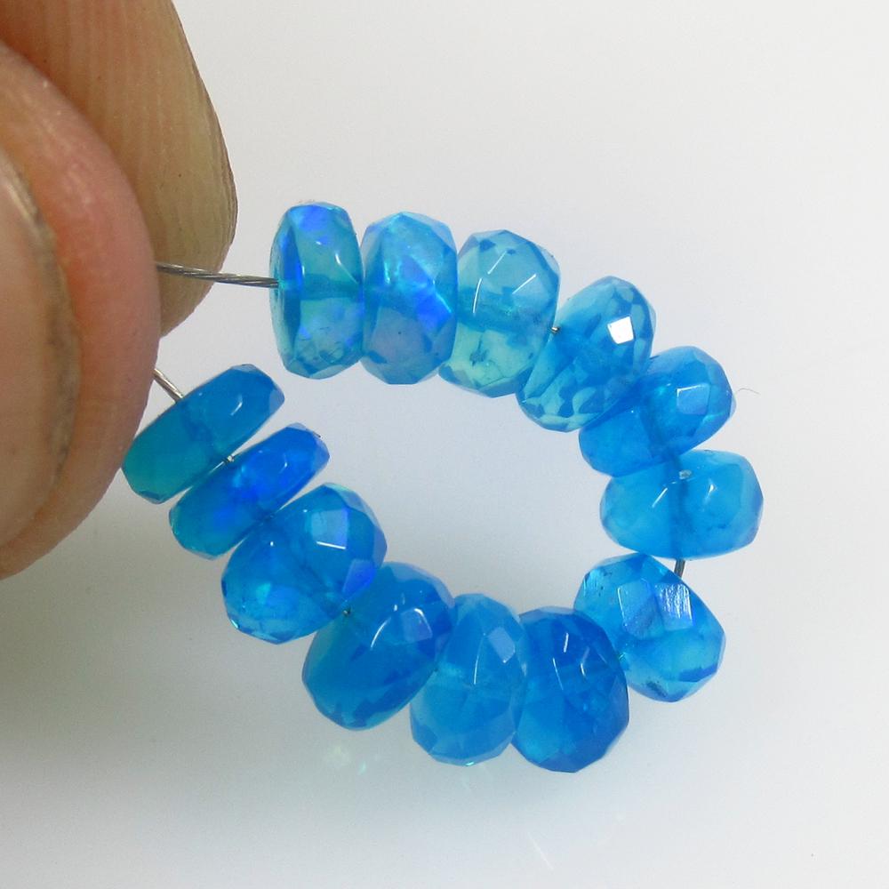 5.40 Ct Natural 13 Drilled Neon Blue Faceted Fire Opal: No Reserve! Title: 5.40 Ct Natural 13 Drilled Neon Blue Faceted Fire Opal Beads Stone Clarity: Transparent Gemstones: Natural Blue Opal Beads Carat Weights: 5.4 Size/Dimensions: 5.20 to 6.50 mm / 13 P