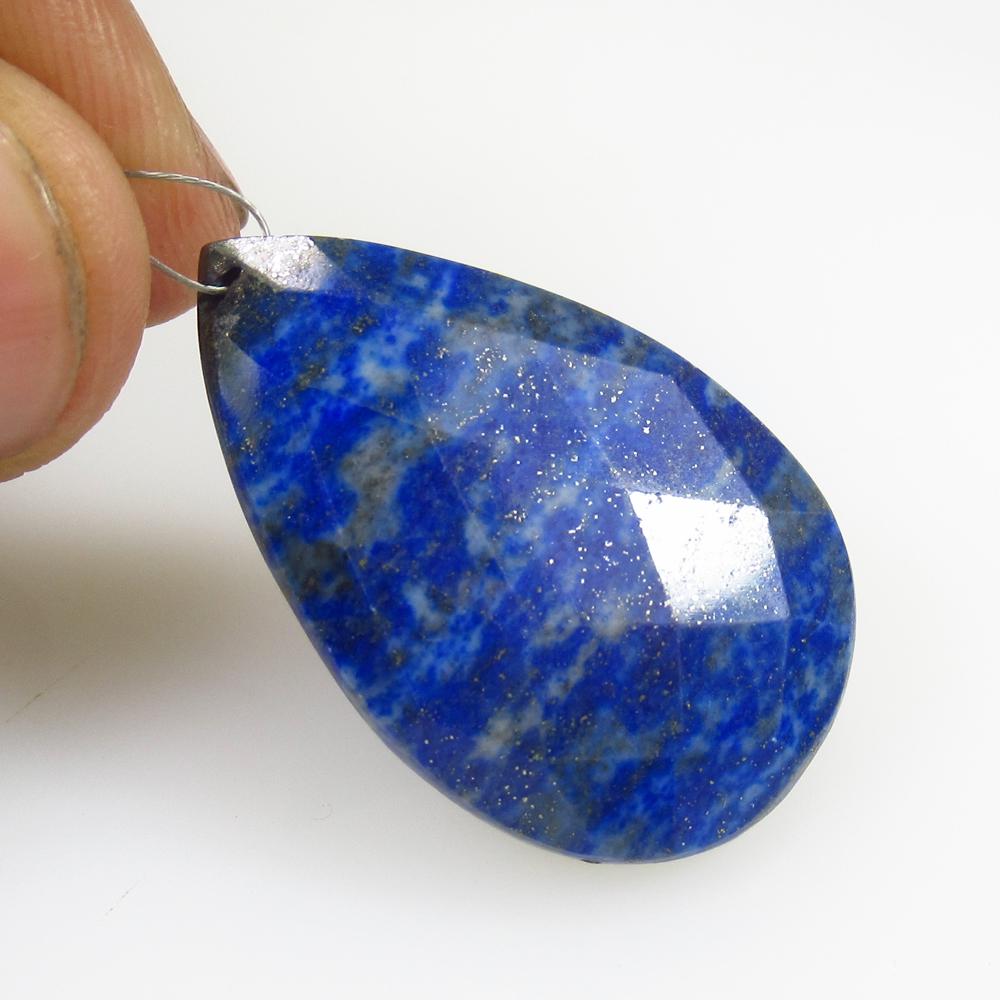 39.51 Ct Natural Drilled Blue Lapis Lazuli Pear Cut: No Reserve! Title: 39.51 Ct Natural Drilled Blue Lapis Lazuli Pear Cut Stone Clarity: Opaque Gemstones: Natural Lapis Lazuli Carat Weights: 39.51 Size/Dimensions: 35.00 x 22.00 x 7.00 mm Additional In