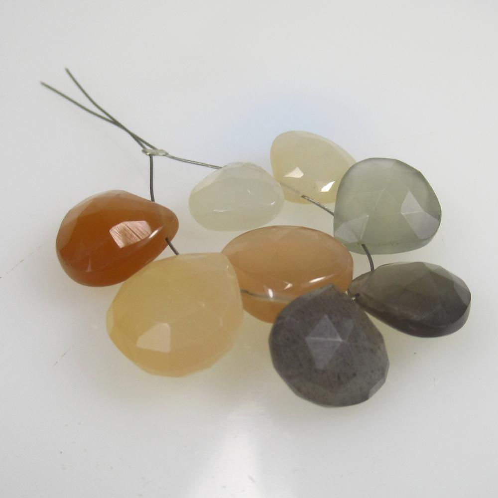 31.96 Ct Natural 5 Drilled Moonstone Pear Beads: No Reserve! Title: 31.96 Ct Natural 5 Drilled Moonstone Pear Beads Stone Clarity: Opaque Gemstones: Natural Moonstone Beads Carat Weights: 31.96 Size/Dimensions: 9.6x9.6 to 12.0x12.5 mm / 8 PC's Addit