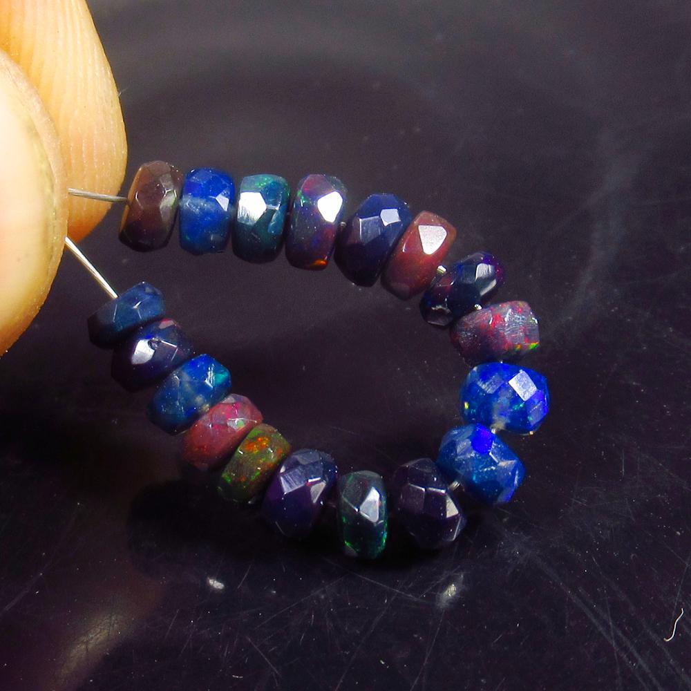 3.45 Ct Natural 18 Drilled Faceted Black Fire Opal: No Reserve! Title: 3.45 Ct Natural 18 Drilled Faceted Black Fire Opal Beads Stone Clarity: Translucent Gemstones: Natural Black Opal Beads Carat Weights: 3.45 Size/Dimensions: 3.80 to 4.30 mm / 18 PC'