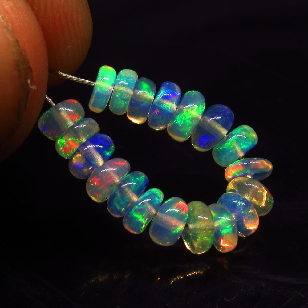 3.30 Ct Natural 19 Drilled Multicolor Fire Opal Beads: No Reserve! Title: 3.30 Ct Natural 19 Drilled Multicolor Fire Opal Beads Stone Clarity: Translucent Gemstones: Natural Opal Beads Carat Weights: 3.3 Size/Dimensions: 4.00 to 4.60 mm / 19 PC's Addition