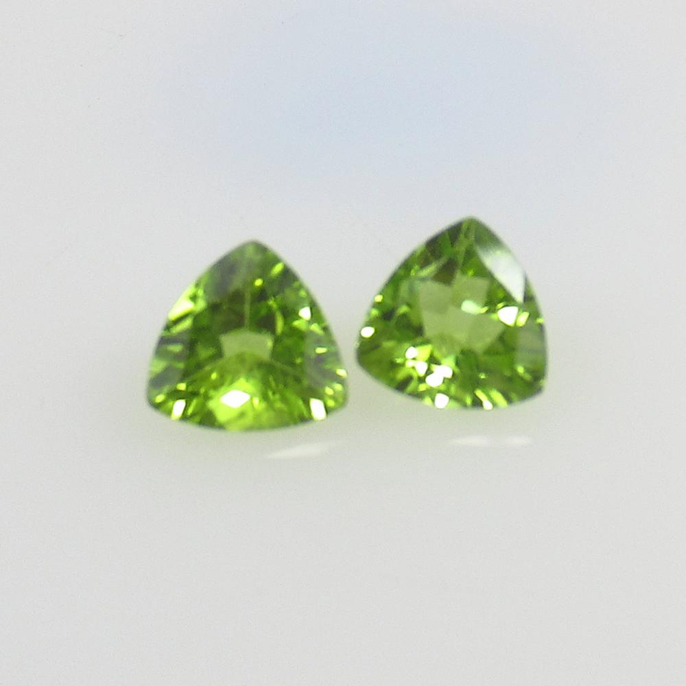 2.00 Ct Natural Pakistan Peridot Trillion Pair: No Reserve! Title: 2.00 Ct Natural Pakistan Peridot Trillion Pair Stone Clarity: VVS Gemstones: Natural Peridot Carat Weights: 2 Size/Dimensions: 6.80 x 6.60 x 3.50 mm / 2 PC's Additional Information: