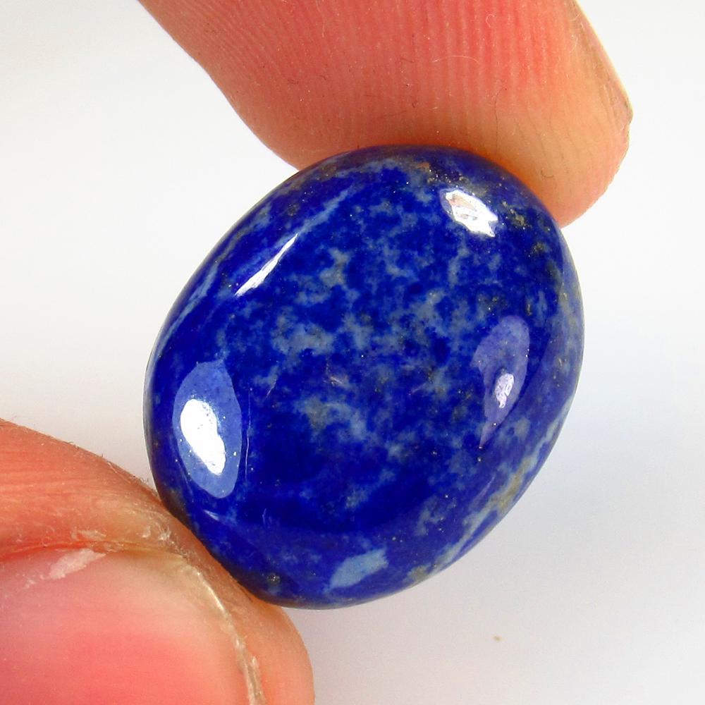12.09 Ct Natural Lapis Lazuli Oval Cab: No Reserve! Title: 12.09 Ct Natural Lapis Lazuli Oval Cab Stone Clarity: Opaque Gemstones: Natural Lapis Lazuli Carat Weights: 12.09 Size/Dimensions: 18.50 x 14.50 x 5.10 mm Additional Information: Ni
