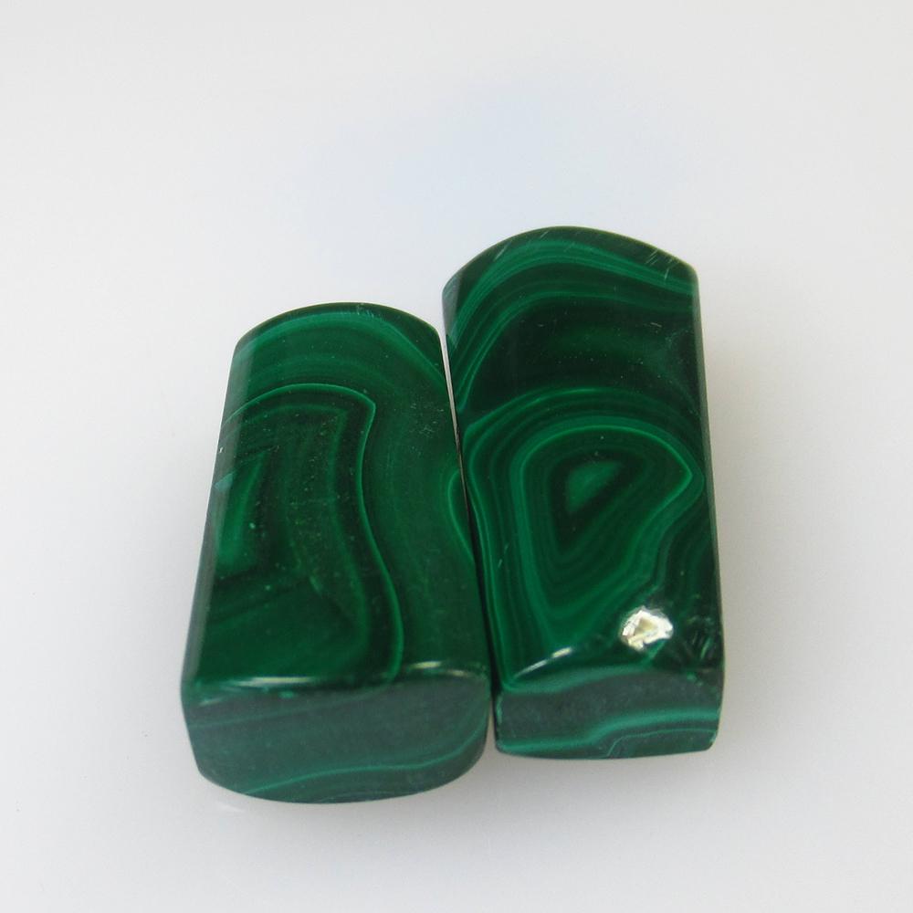 34.25 Ct Natural Green Malachite Fancy Pair: No Reserve! Title: 34.25 Ct Natural Green Malachite Fancy Pair Stone Clarity: Opaque Gemstones: Natural Malachite Carat Weights: 34.25 Size/Dimensions: 19.20 x 9.30 x 5.90 mm / 2 PC's Additional Infor