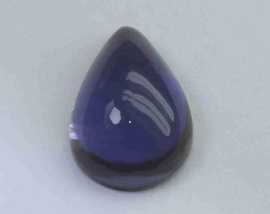 2.87 Cts Natural Iolite: No Reserve! Title: 2.87 Cts Natural Iolite Additional Information: Gemstone: Natural Iolite Origin: India Weight: 2.87 Carats Measurements: 12x8.9x4.7 Shape / Cut: Pear Cabochon Colour: Violet Blue Tr