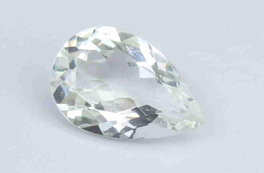 0.93 Cts Natural White beryl: No Reserve! Title: 0.93 Cts Natural White beryl Additional Information: Gemstone : Natural White beryl Origin : Brazil Weight : 0.93 carats Dimensions : 9x6x3.2 mm Shape : Pear Cut Color : Colorless T