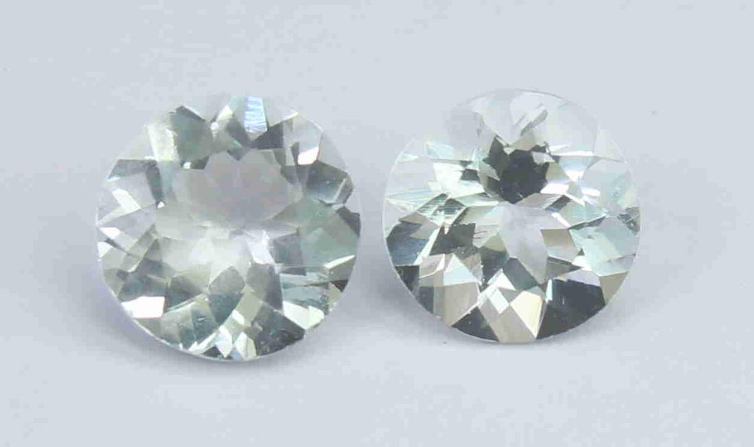 1.88 Cts Natural White beryl Lot: No Reserve! Title: 1.88 Cts Natural White beryl Lot Additional Information: Gemstone : Natural White beryl Origin : Brazil Weight : 1.88 carats Dimensions : 7-6.9x3.6 mm , 6.8-6.6x4.1 mm Shape : Round