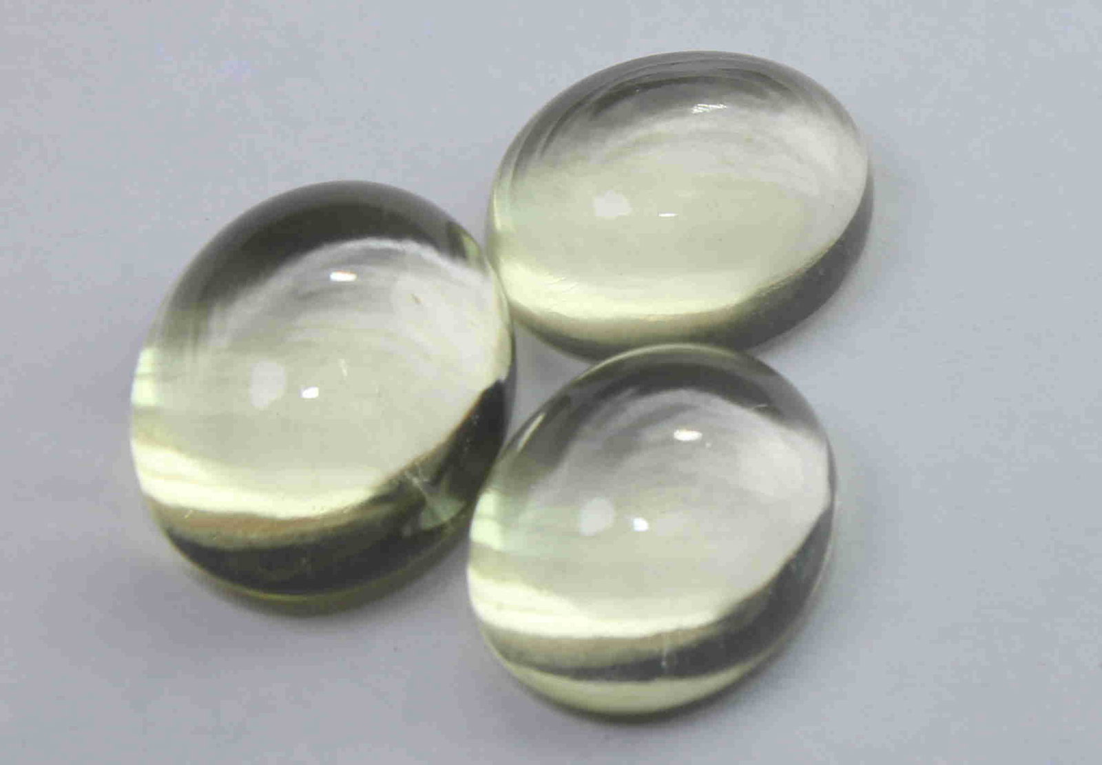 14.00 Cts Natural Lemon Quartz Lot: No Reserve! Title: 14.00 Cts Natural Lemon Quartz Lot Additional Information: Gemstone : Natural Lemon Quartz Weight : 14.00 Carats Dimensions : 12.1x9.8x6.9 mm , 11x9x5.8 mm , 10.9x8.8x5 mm Shape : O