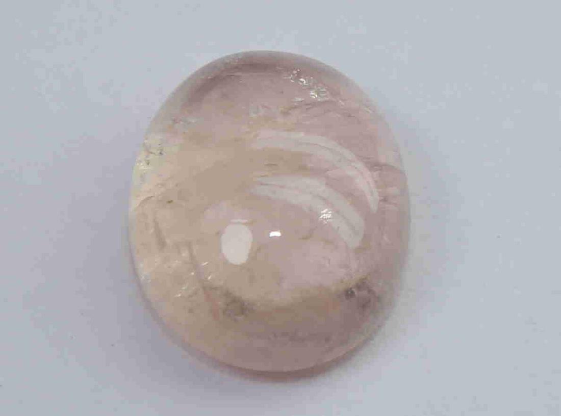 2.81 Cts Natural Morganite: No Reserve! Title: 2.81 Cts Natural Morganite Additional Information: Gemstone: Natural Morganite Origin: Africa Weight: 2.80 Carats Measurements: 9.9x7.9x4.4 mm Shape : Oval Cabochon Colour: