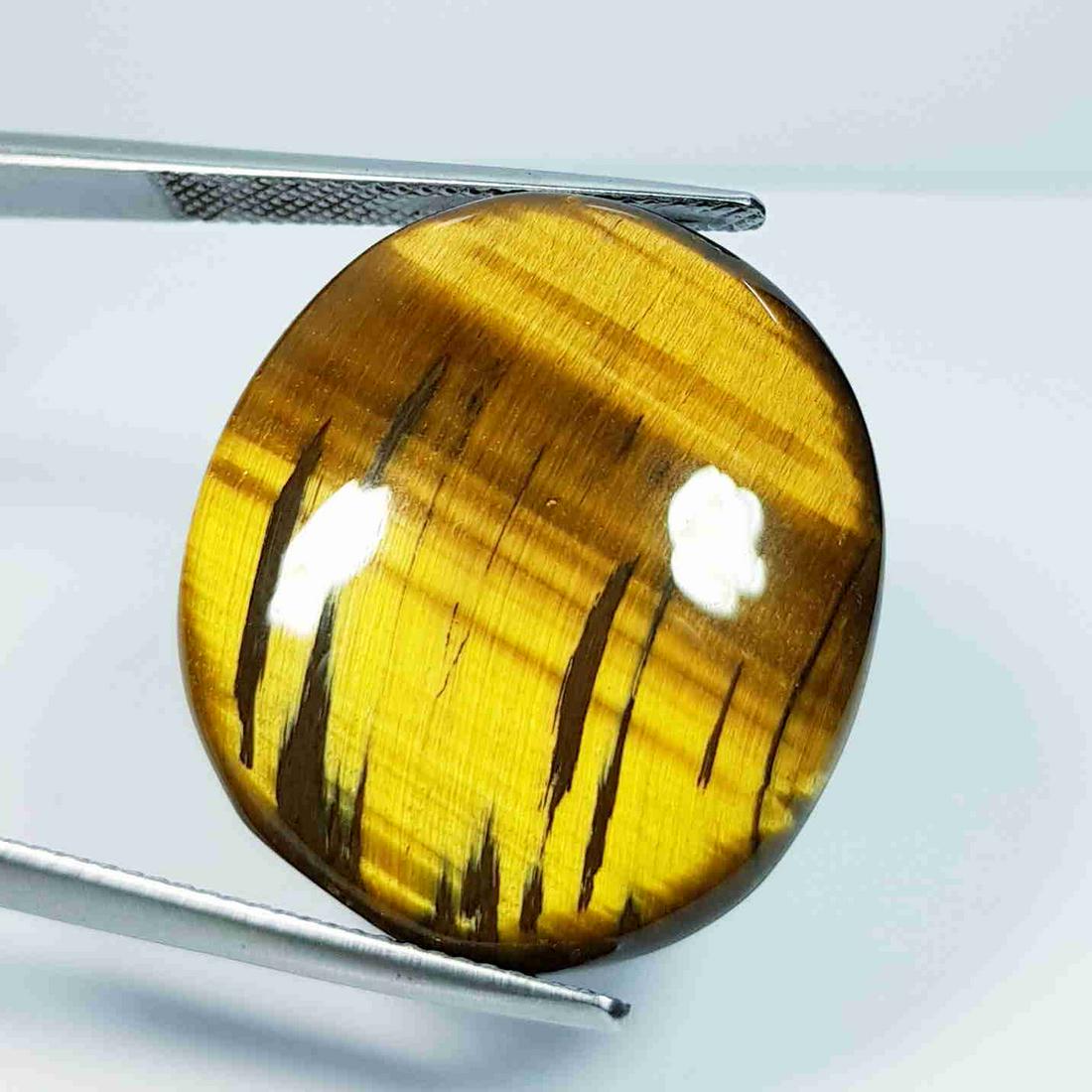 28.70 Ct Natural Tiger Eye Oval Cabochon (1 of 4)