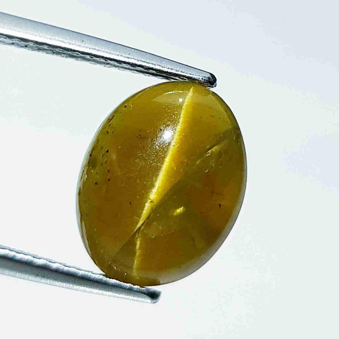 Natural Apatite cat's Eye 6.35 ct: No Reserve! Title: Natural Apatite cat's Eye 6.35 ct Color/Clarity: Opaque Gemstones: Loosegemstone Carat Weights: 6.35 Size/Dimensions: 12.20 x 9.80 x 6.00 Additional Information: Oval - Srilanka Shi