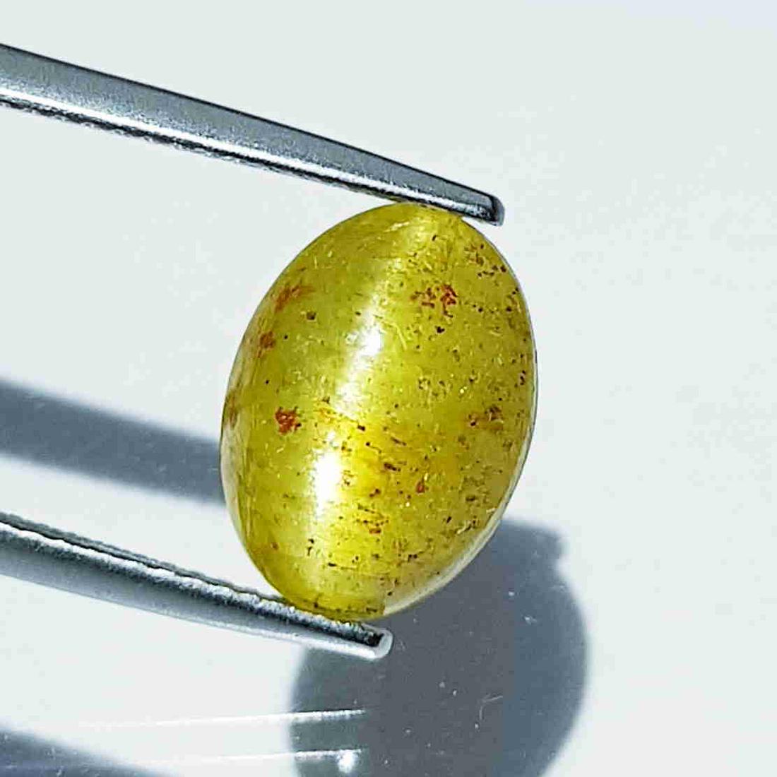 Natural Apatite cat's Eye 6.63 ct: No Reserve! Title: Natural Apatite cat's Eye 6.63 ct Color/Clarity: Opaque Gemstones: Loosegemstone Carat Weights: 6.63 Size/Dimensions: 12.10 x 9.00 x 7.10 Additional Information: Oval - Srilanka Shi