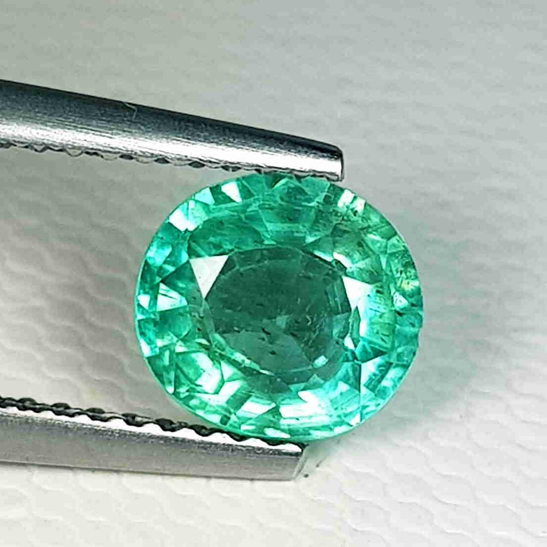 1.41 ct Natural Bluish Green Apatite: No Reserve! Title: 1.41 ct Natural Bluish Green Apatite Color/Clarity: VS Gemstones: Loosegemstone Carat Weights: 1.41 Size/Dimensions: 7.00 x 6.50 x 4.10 Additional Information: Oval - Madagascar Shi
