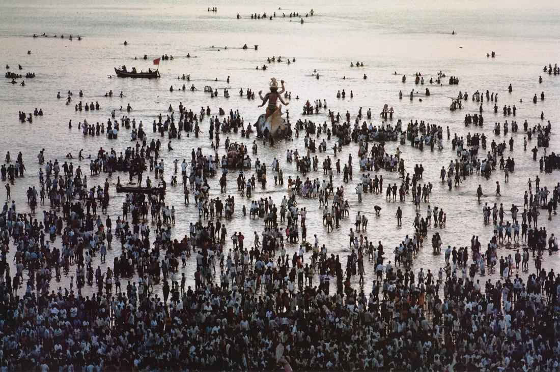 STEVE MCCURRY - Ganesh Chaturthi Festival, 1994: Artist: Steve McCurry Title: Ganesh Chaturthi Festival, Chowpatty Beach, Mumbai, India, 1994 Medium: Photo Litho, 2012, Italy Dimensions: 14x9.3" Description: Heat Wax Mounted on 14x18" Conservation B