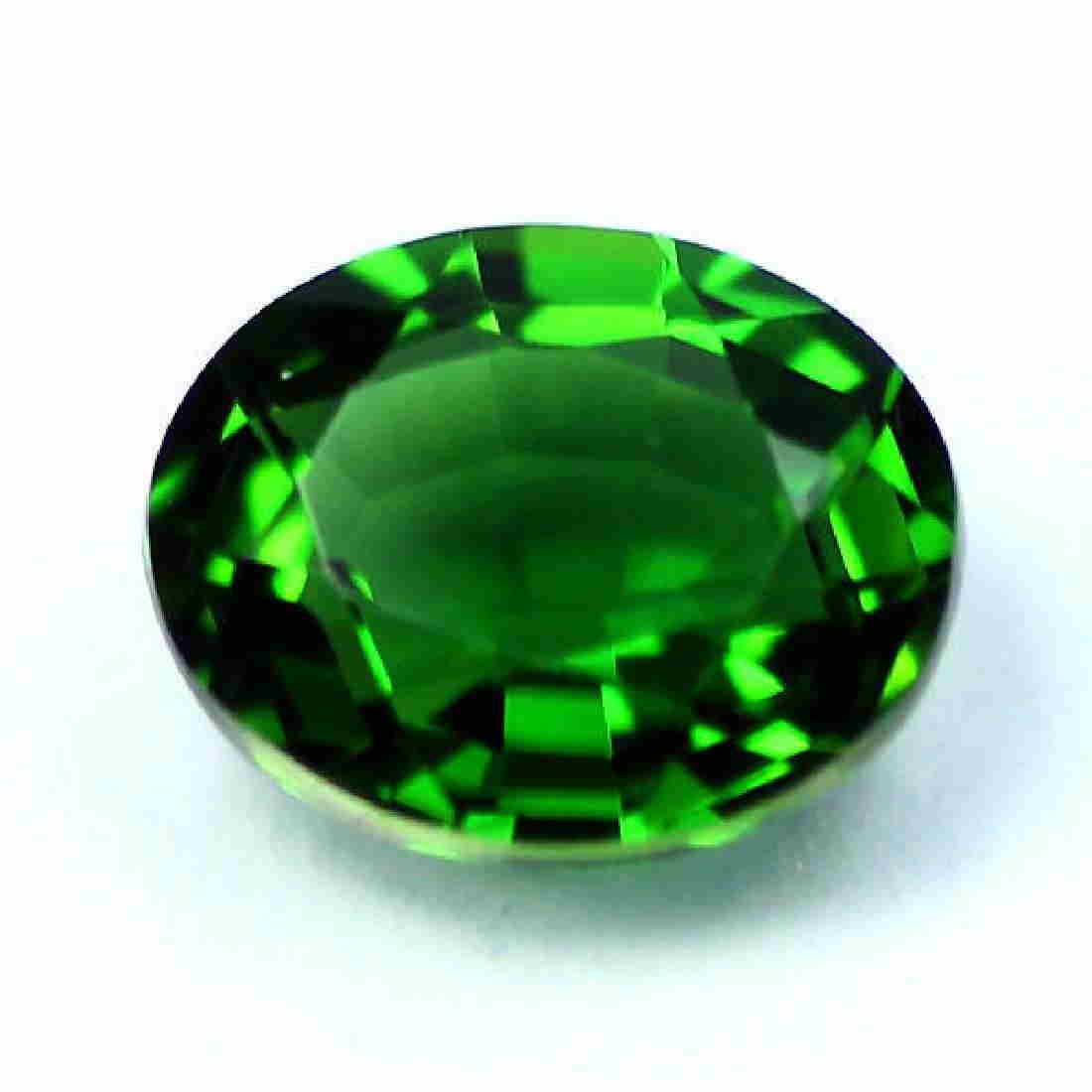 1,65 cts certified chrome tourmaline: Title: 1,65 cts certified chrome tourmaline Color/Clarity: VVS/intense green Gemstone Type: natural/untreated Carat Weights: 1.65 Size/Dimensions: 9.2 x7.1 x3.8 mm Additional Information: Nigeria Rese
