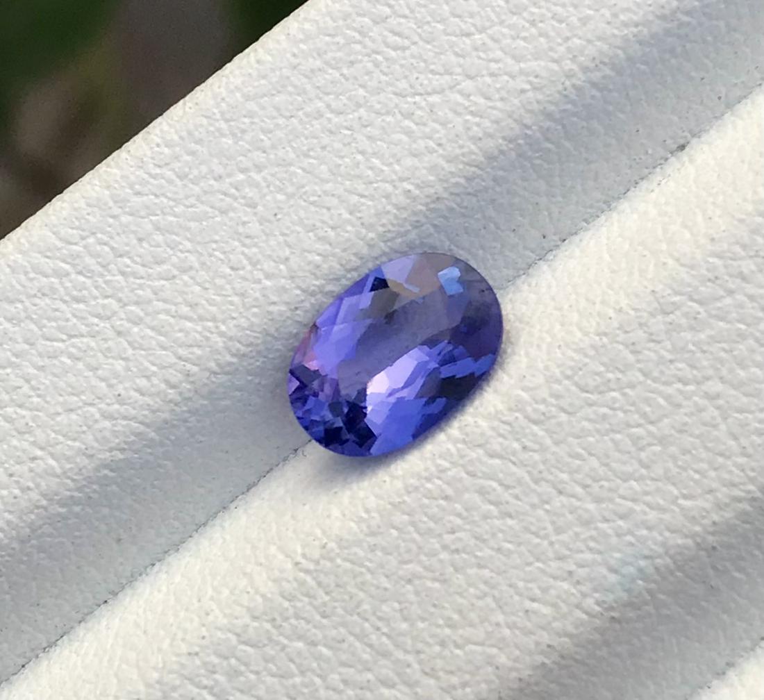 1.20 C.t Oval Cut Rare Purple Blue! Natural Tanzanite: Title: 1.20 C.t Oval Cut Rare Purple Blue! Natural Tanzanite Unheated *gempiece* Origin: Pakistan Additional Information: Treatment: None Condition: Natural Name: Tanzanite Color: Purple Blue Weight: 