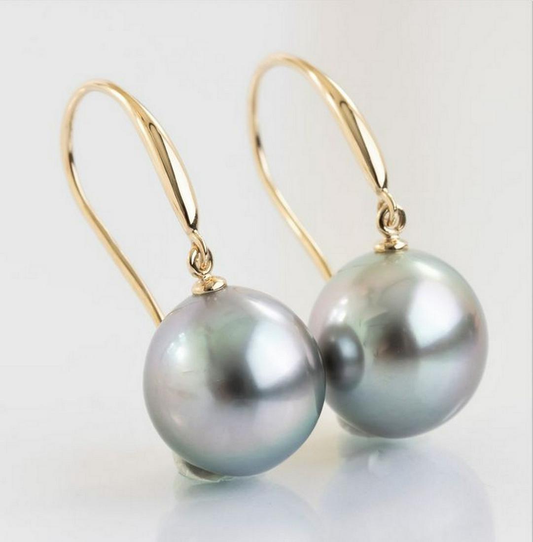 10x11mm Peacock Tahitian Pearl Drops - Earrings: Title: 10x11mm Peacock Tahitian Pearl Drops - Earrings Description: Emerging from the tropical lagoons of French Polynesia, these Tahitian pearls have been hand selected for their natural beautiful pe