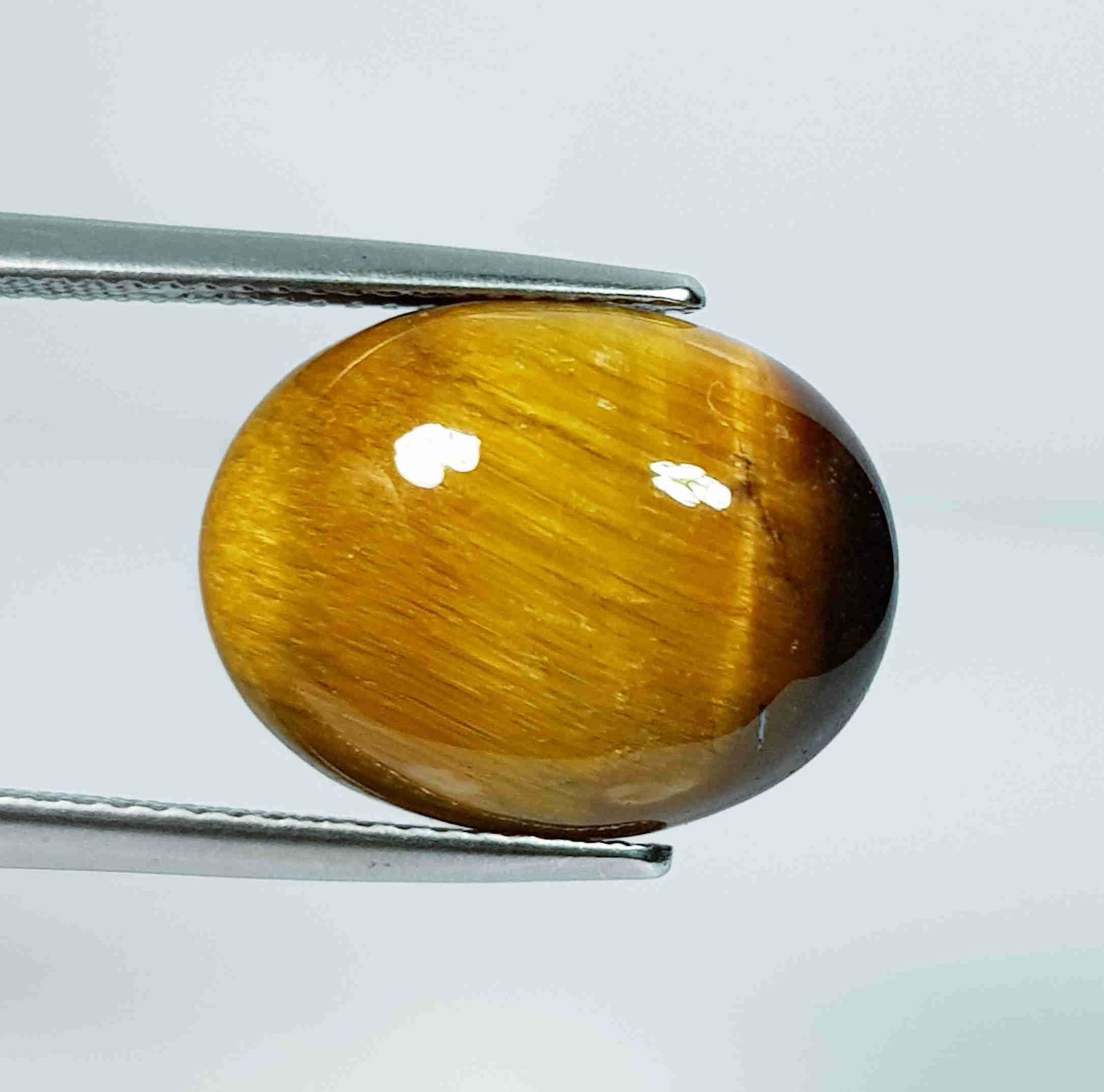 12.26 Ct Natural Tiger Eye Oval Cabochon (1 of 4)