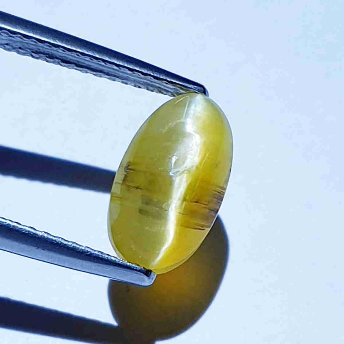 3.32 ct Natural Opal Cat's Eye: No Reserve! Title: 3.32 ct Natural Opal Cat's Eye Color/Clarity: Semi Transparent Gemstones: Loosegemstone Carat Weights: 3.2 Size/Dimensions: 10.10 x 7.20 x 7.20 Additional Information: Oval - Africa
