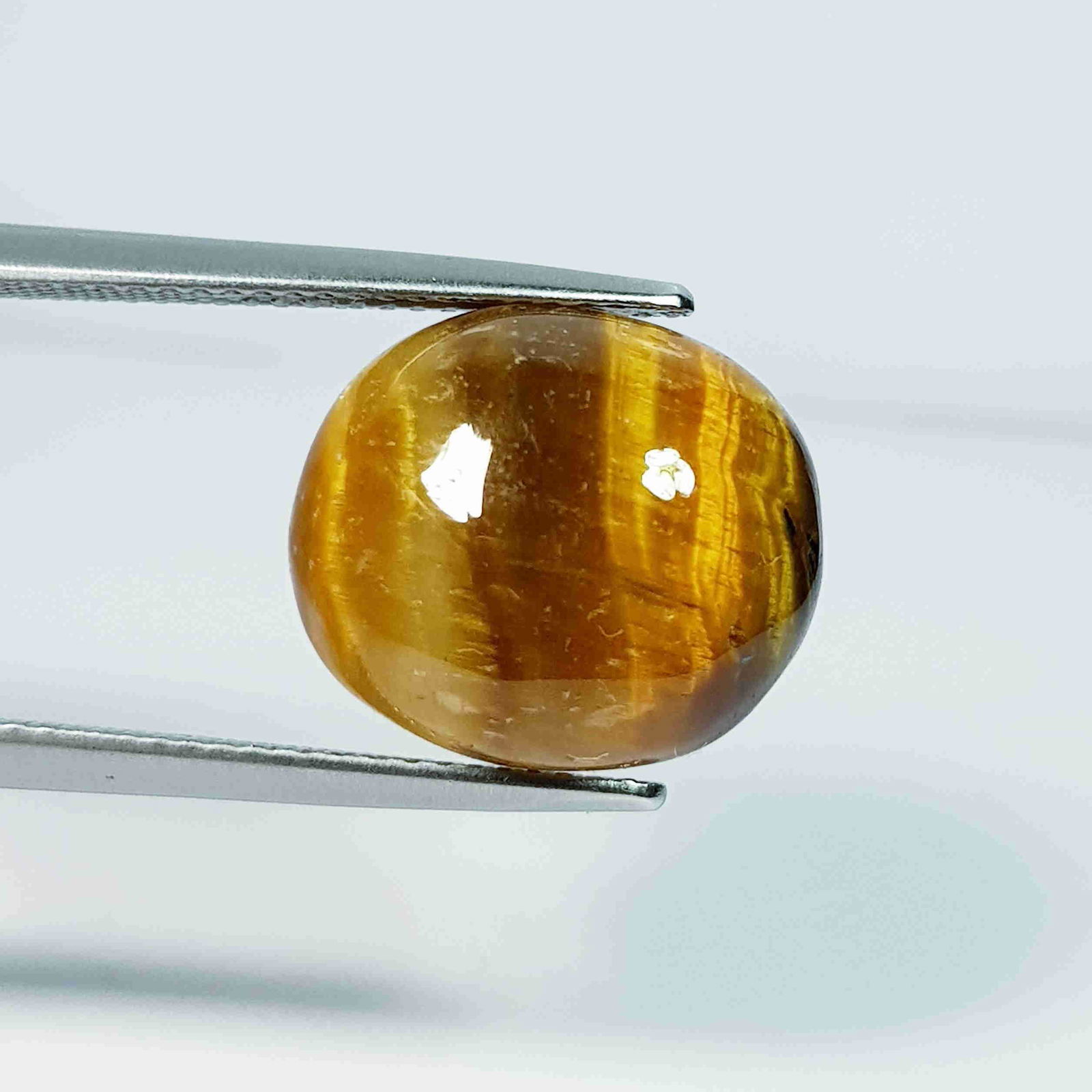 11.15 Ct Natural Tiger Eye Oval Cabochon (1 of 4)