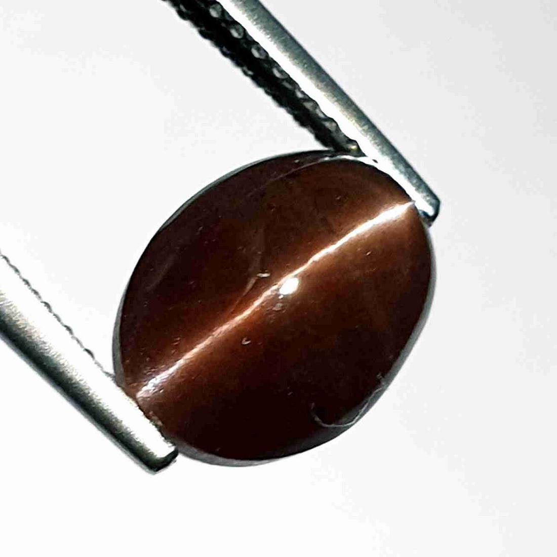 Natural Scapolite Cat's Eye 3.75 ct: No Reserve! Title: Natural Scapolite Cat's Eye 3.75 ct Color/Clarity: Opaque Gemstones: Loosegemstone Carat Weights: 3.75 Size/Dimensions: 10.60 x 7.80 x 6.00 Additional Information: Oval - Africa Shi
