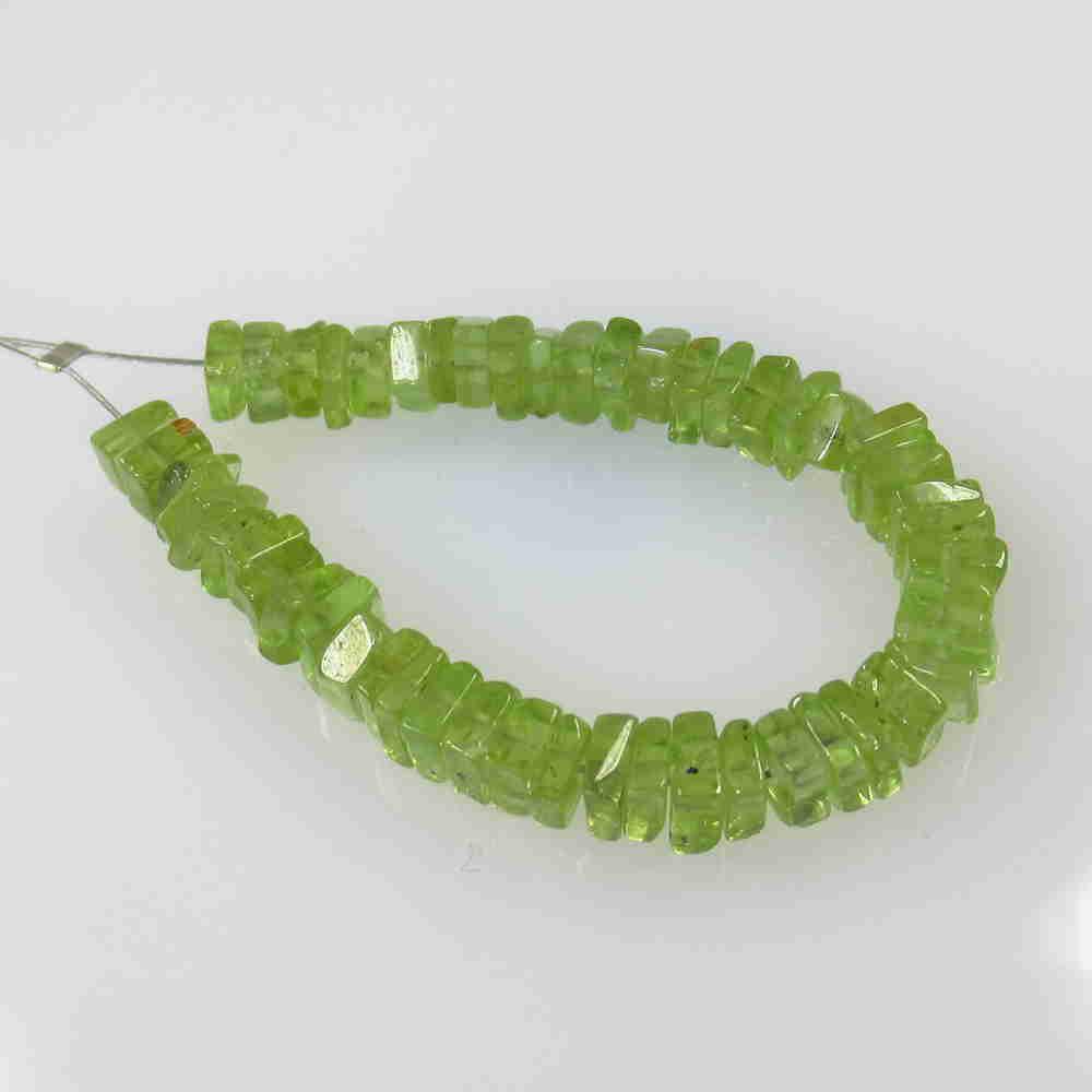 17.18 Ctw Natural 52 Drilled Round Peridot Square Beads: No Reserve! Title: 17.18 Ctw Natural 52 Drilled Round Peridot Square Beads Stone Clarity: Transparent Gemstone: Natural Peridot Beads Carat Weight: 17.18 Size/Dimensions: 3.90 to 4.20 mm / 52 PC's Add