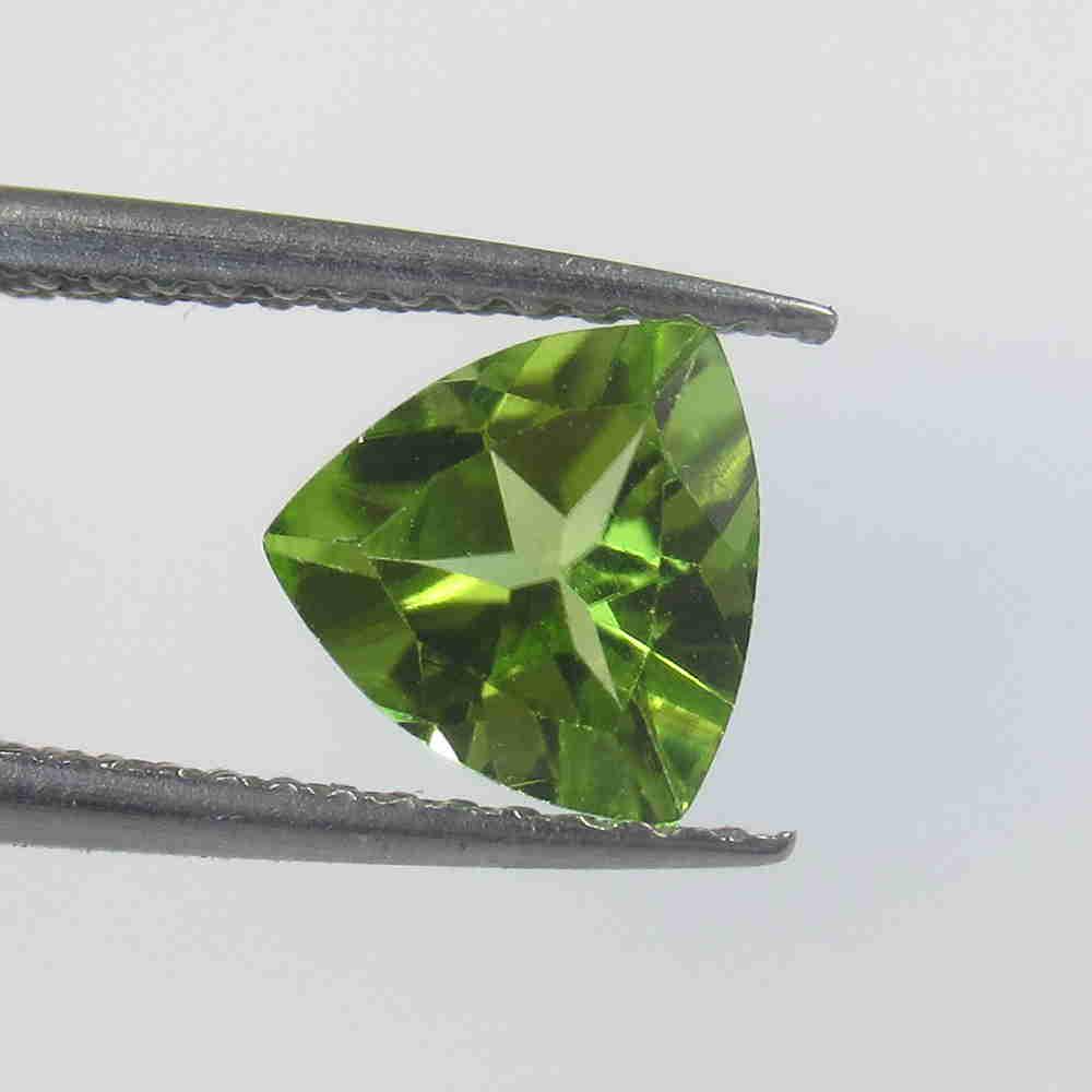 0.91 Ctw Natural Pakistan Peridot Trillion Cut: No Reserve! Title: 0.91 Ctw Natural Pakistan Peridot Trillion Cut Stone Clarity: VVS Gemstone: Peridot Carat Weight: 0.91 Size/Dimensions: 6.90 x 6.90 x 3.50 mm Additional Information: Top Class Luste