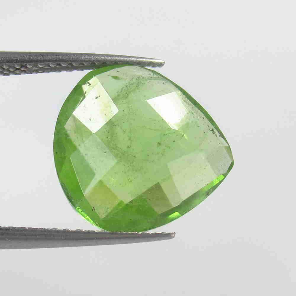 5.74 Ctw Natural Pakistan Peridot Pear Checkerboard Cut: No Reserve! Title: 5.74 Ctw Natural Pakistan Peridot Pear Checkerboard Cut Stone Clarity: VVS Gemstone: Peridot Carat Weight: 5.74 Size/Dimensions: 13.20 x 12.80 x 5.00 mm Additional Information: Top 
