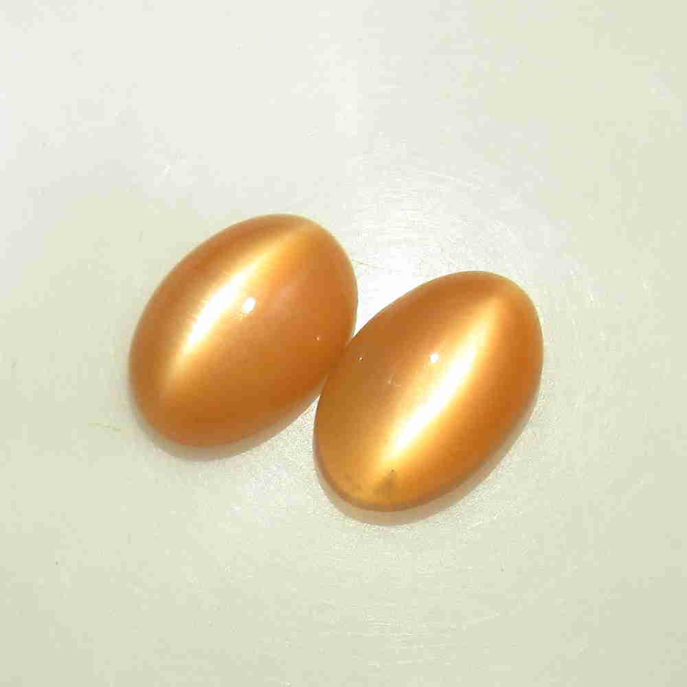 10.86 Ctw Natural Moonstone Oval Pair: No Reserve! Title: 10.86 Ctw Natural Moonstone Oval Pair Stone Clarity: Opaque Gemstone: Natural Moonstone Carat Weight: 10.86 Size/Dimensions: 13.90 x 9.90 x 5.60 mm / 2 PC's Additional Information: 