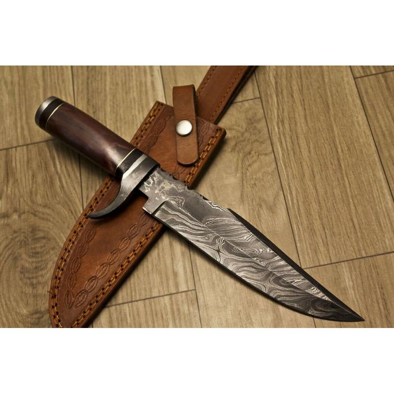 Camping damascus steel knife handmade camel bone: Knife "Freeport" made of damask steel. Handle – camel bone and scabbard - genuine leather. Damascus knives are very durable, look great and keep sharpness perfectly. Damascus steel has high quality