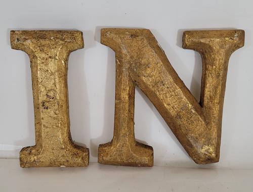 Carved and gilded letters IN ca 1880-1900: Title: Carved and gilded letters IN ca 1880-1900 Provenance/Additional Info: Two carved and painted letters with true gold leaf gilding. Very good condition with a flake beginning on the top of the N.
