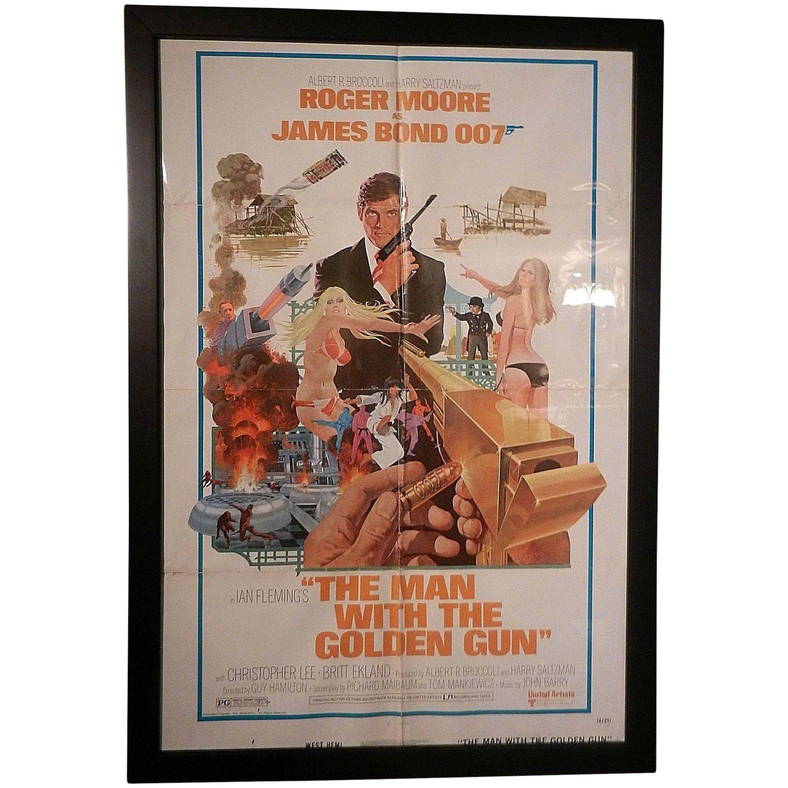 Vintage Original 1974 James Bond Man with the Golden: This Vintage Original 1974 James Bond Man with the Golden Gun Staring Roger Moore Movie Poster is in very good condition (would be excellent if it had been rolled). It has been folded and creases can