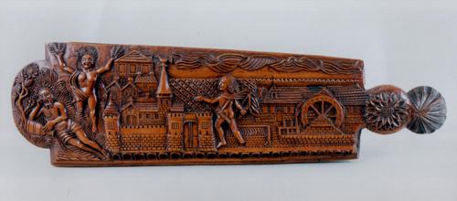 A fine elaborately carved wood tobacco rasp decorated (1 of 2)