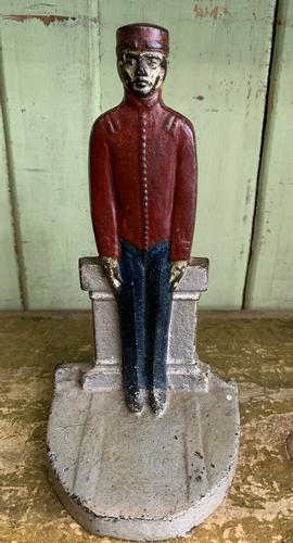ANTIQUE Cast Iron Bellhop Figural Doorstop rare red (1 of 7)