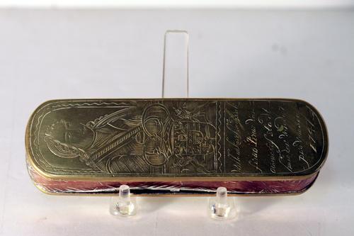 A brass and copper tobacco box decorated on the top (1 of 3)