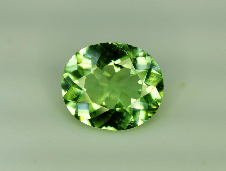 Peridot, 2.30 Carats Top Quality Peridot Gemstone From: Materials: Peridot Carat weight: 2.30 Description Dimensions (mm) 10x9x4 mm ..... Weight (carats) 2.30 Carat ..... No Treatment: Natural Gemstone ..... Peridot (pronounced pair-uh-doe) is the gem form