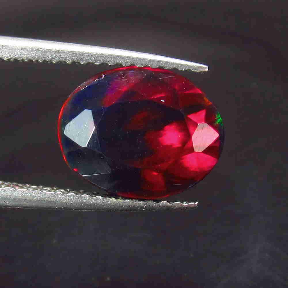 1.73 Ctw Natural Ethiopian Black Fire Opal Oval Cut: Title: 1.73 Ctw Natural Ethiopian Black Fire Opal Oval Cut Stone Clarity: Translucent Gemstones: Black Opal Size/Dimensions: 1.73 Carat Weights: 10.20 x 8.20 x 5.30 mm Additional Information: Excellen