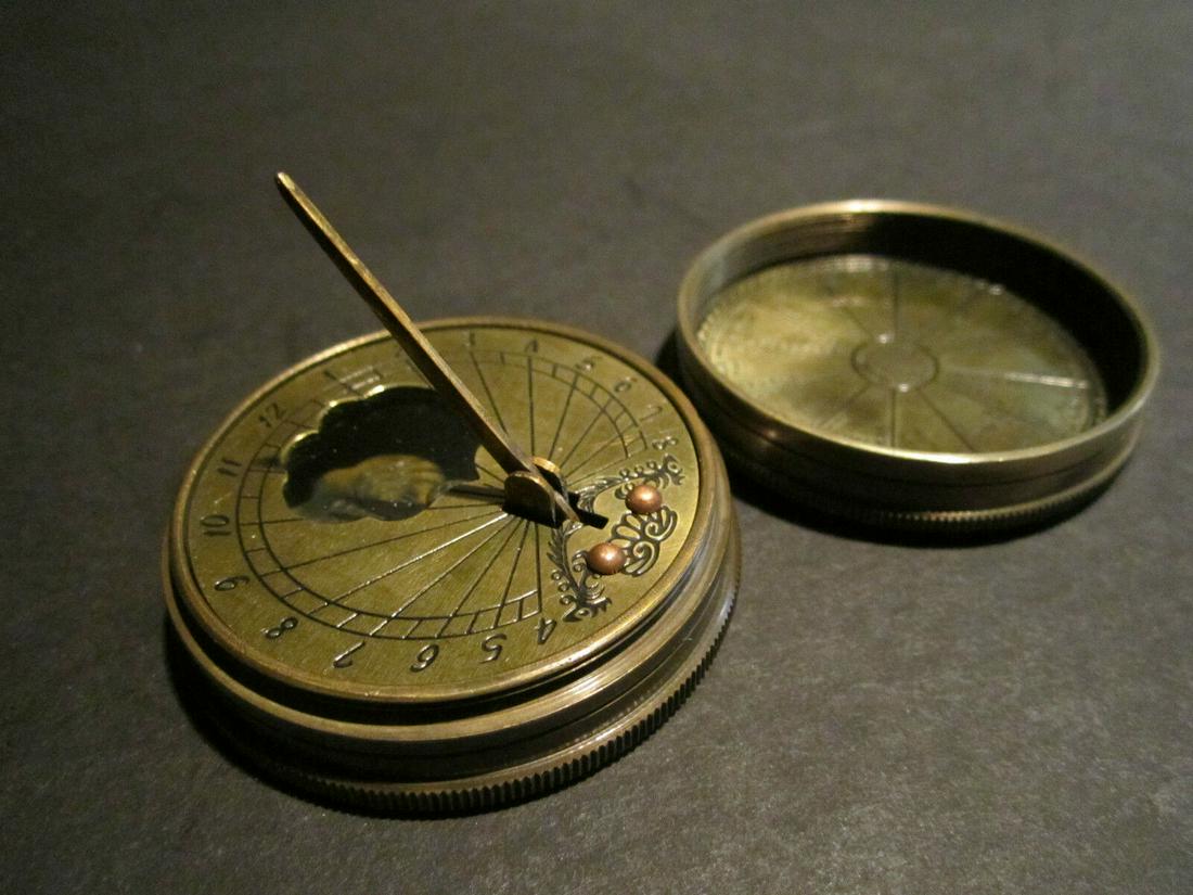 Brass Timekeeping Sundial with Top Pocket Compass Watch: 2" Round Nice reproduction of an antique sundial, compass with lid referenced in several antique reference books. See "Collectors Illustrated Encyclopedia of The American Revolution" by George Neumann