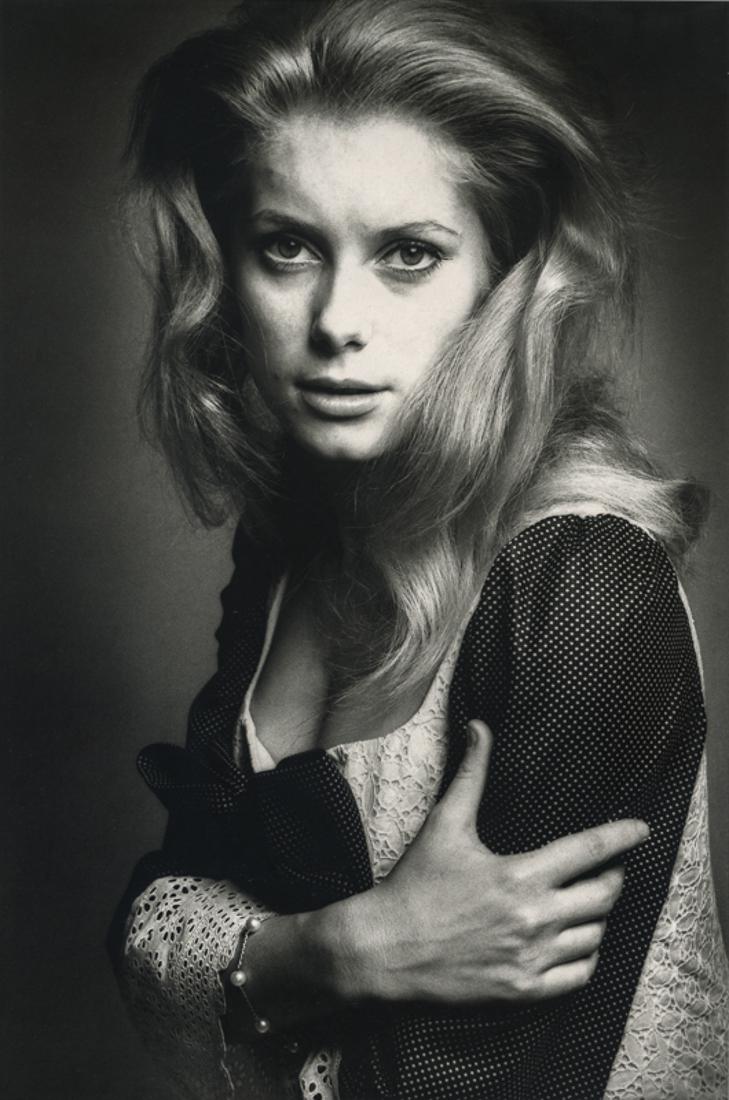 JEANLOUP SIEFF - Catherine Deneuve, Paris, 1965: Artist: Jeanloup Sieff Title: Catherine Deneuve, Paris, 1965 Medium: Photo Litho, 1990, France Dimensions: 7.4x11.15" Description: Heat Wax Mounted on 12x16" Conservation Board Artist Bio: Jeanloup Si