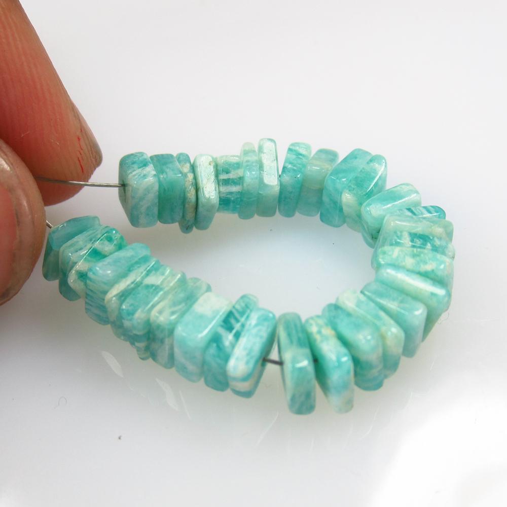 21.09 Ct Natural 33 Drilled Amazonite Square Beads: No Reserve! Title: 21.09 Ct Natural 33 Drilled Amazonite Square Beads Stone Clarity: Opaque Gemstone: Natural Amazonite Beads Carat Weight: 21.09 Size/Dimensions: 5.0x5.0 to 6.0x6.0 mm / 33 PC's Addit