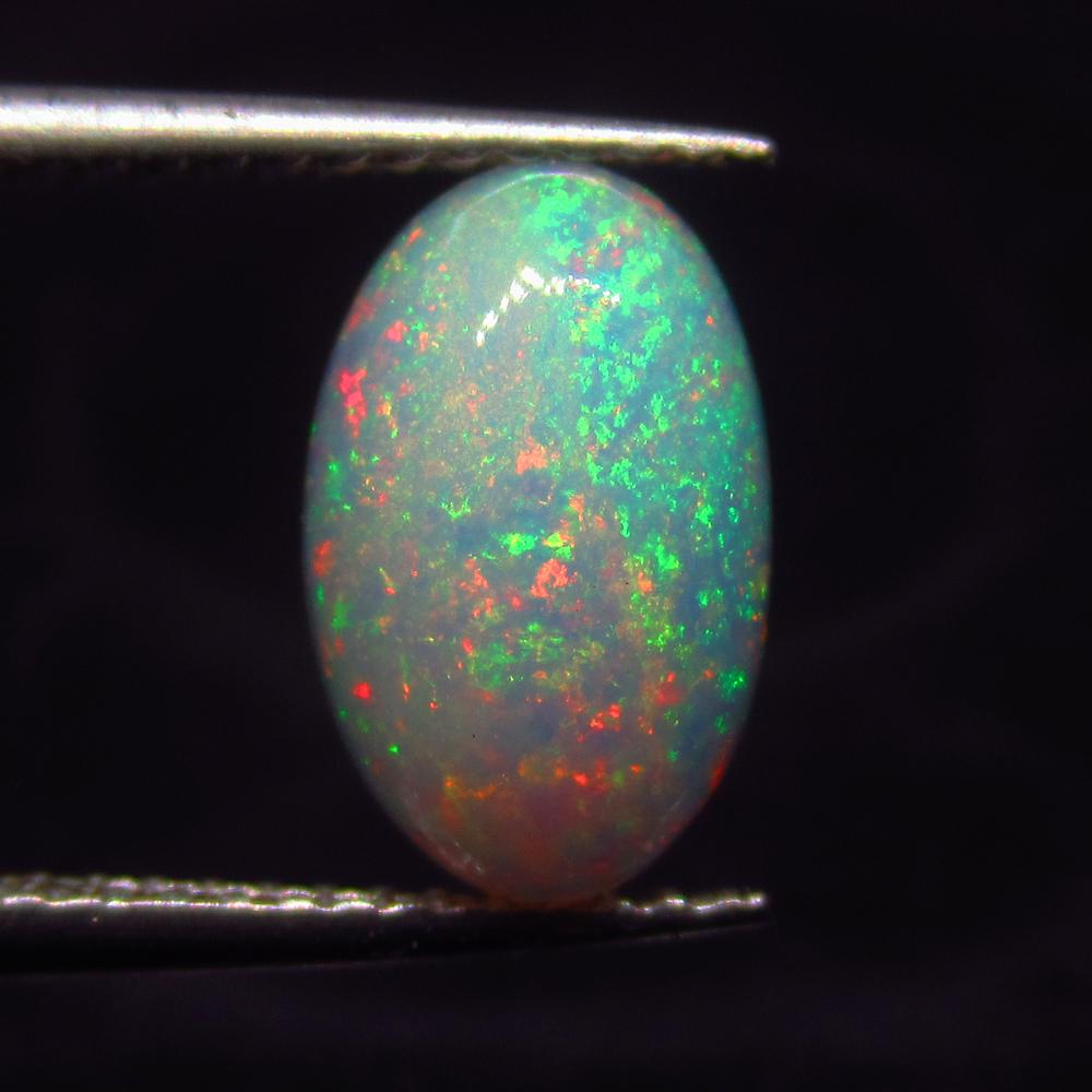 1.40 Ct Natural Ethiopian Multicolor Fire Opal Oval Cab (1 of 2)