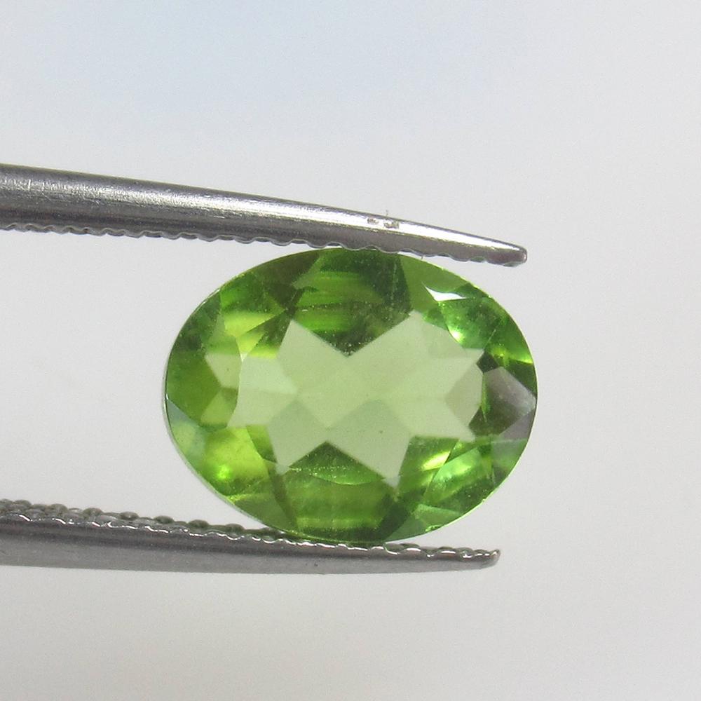 1.84 Ct Natural Pakistan Peridot Oval Cut: No Reserve! Title: 1.84 Ct Natural Pakistan Peridot Oval Cut Stone Clarity: VVS Gemstone: Natural Peridot Carat Weight: 1.84 Size/Dimensions: 9.10 x 7.10 x 3.80 mm Additional Information: Top Class Lu