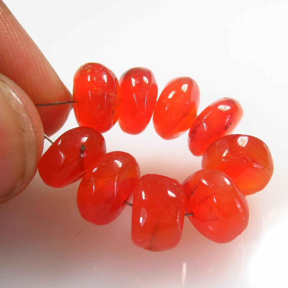 33.20 Ct Natural 9 Drilled Carnelian Round Beads: No Reserve! Title: 33.20 Ct Natural 9 Drilled Carnelian Round Beads Stone Clarity: Semi-Transparent Gemstone: Natural Carnelian Beads Carat Weight: 33.2 Size/Dimensions: 9.20 - 9.70 mm / 9 PC's Additi