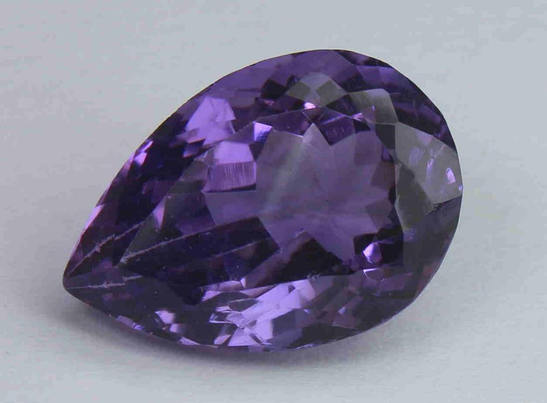 8.81 Cts Natural Amethyst: No Reserve! Title: 8.81 Cts Natural Amethyst Description: Gemstone : Natural Amethyst Origin: Brazil Weight: 8.81 carats Dimensions: 16x11.2x8.9 mm Shape/Cut: Pear Cut Colour: Purple Transparency: tra