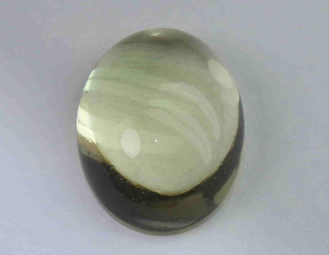 9.84 Cts Natural Lemon Quartz: No Reserve! Title: 9.84 Cts Natural Lemon Quartz Description: Gemstone : Natural Lemon Quartz Weight : 9.84 Carats Dimensions : 16.1x12.1x7.1 mm Shape : Oval Cabochon Colour : Greenish Yellow Origin :