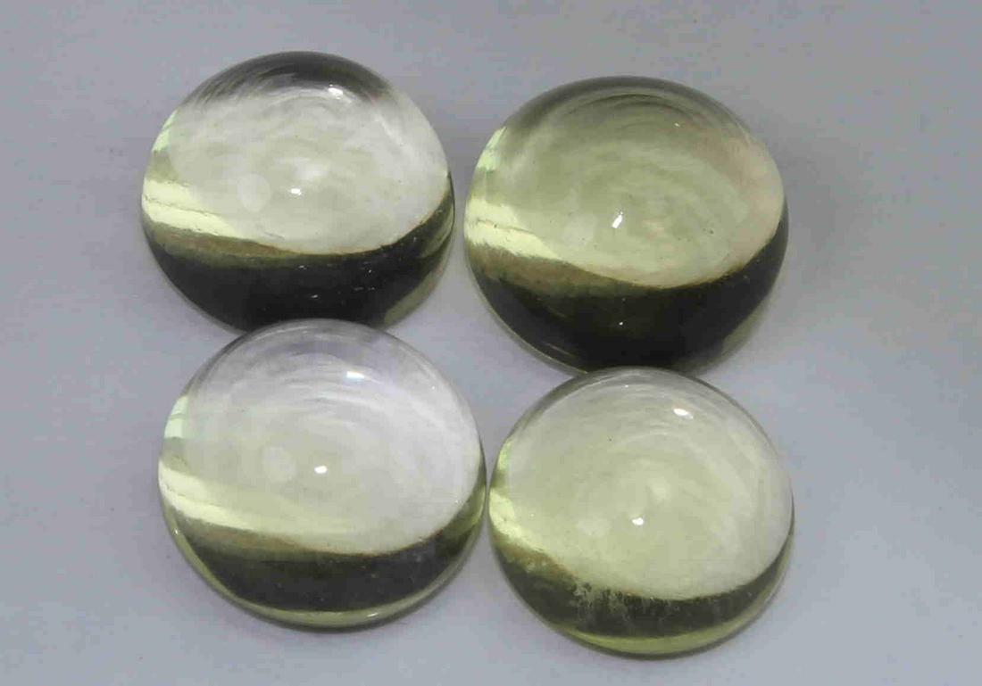 12.19 Cts Natural Lemon Quartz Lot: No Reserve! Title: 12.19 Cts Natural Lemon Quartz Lot Description: Gemstone : Natural Lemon Quartz Weight : 12.19 Carats Dimensions : 9.5-9.3x5.6 mm - 8.7-8.7x4.3 mm Shape : Round Cabochon Number of S