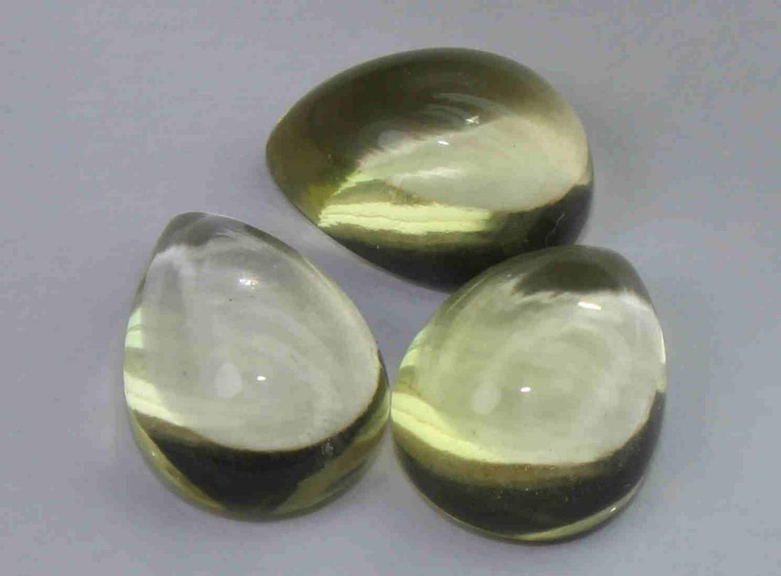 9.97 Cts Natural Lemon Quartz Lot: No Reserve! Title: 9.97 Cts Natural Lemon Quartz Lot Description: Gemstone : Natural Lemon Quartz Weight : 9.97 Carats Dimensions : 10.8x8.3x5.1 mm , 10.6x8x5.6 mm , 10.5x8.4x5.6 mm Shape : Pear Caboc