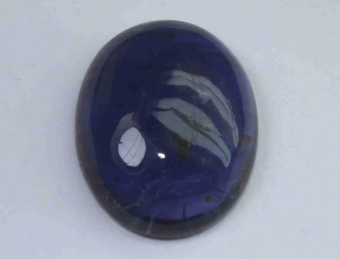 4.46 Cts Natural Iolite: No Reserve! Title: 4.46 Cts Natural Iolite Description: Gemstone: Natural Iolite Weight: 4.46 Carats Measurements: 13.4x10.6x4.4 mm Shape / Cut: Oval Cut Colour: Violet Blue Transparency: transparent