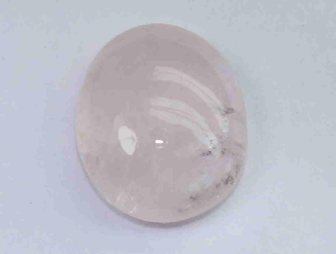 3.53 Cts Natural Morganite: No Reserve! Title: 3.53 Cts Natural Morganite Description: Gemstone: Natural Morganite Origin: Africa Weight: 3.53 Carats Measurements: 10x8x4 mm Shape : Oval Cabochon Colour: Pink Transparency: trans