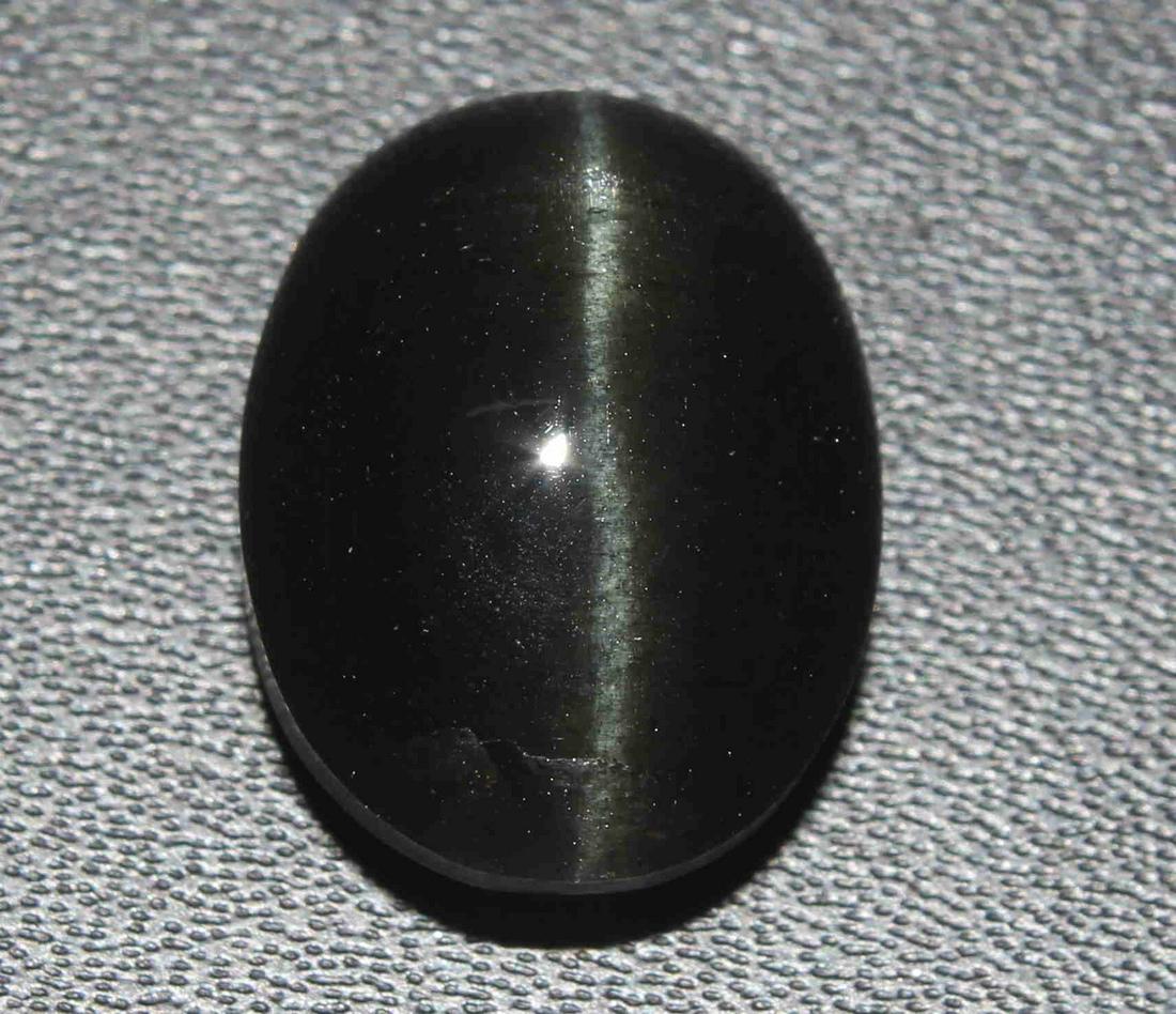 14.15 Cts Natural Scapolite Cat's-Eye Lot: No Reserve! Title: 14.15 Cts Natural Scapolite Cat's-Eye Lot Description: Gemstone : Natural Scapolite Variety: Cat's-Eye Scapolite Origin: Madagascar Weight: 14.15 Carats Dimensions: 16.2x12.3x9 mm S
